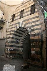 Une image contenant moulin � eau, pierre, vo�te

Description g�n�r�e automatiquement