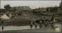 Une image contenant plein air, ciel, sol, maison

Description g�n�r�e automatiquement